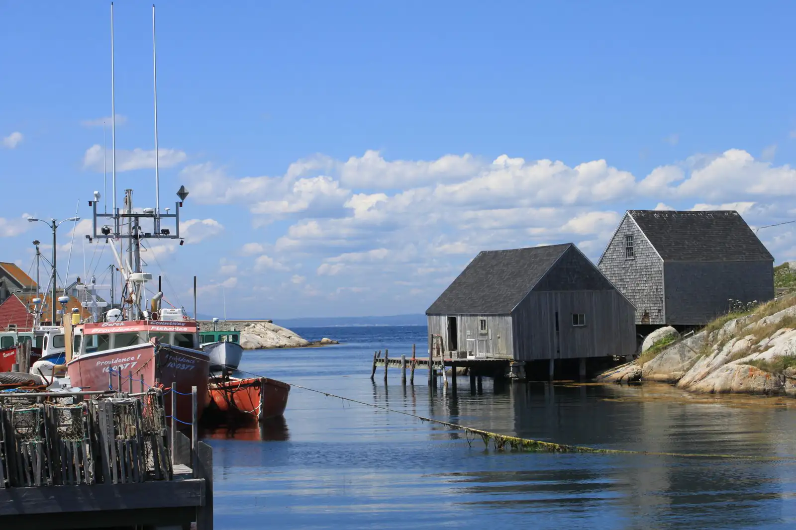 Fishing sheds and boats in the small harbour of Peggy’s Cove, Nova Scotia